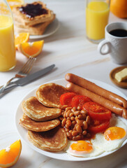 Traditional British breakfast with sausages and beans	