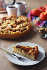 Apple pie with walnuts - typical autumn dish	