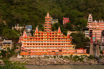 View of Ganga river embankment, Lakshman Jhula bridge and Tera Manzil Temple, Trimbakeshwar in...