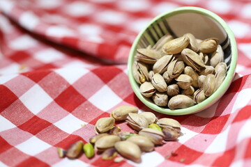 Various Nuts and dried fruits in wooden bowls
