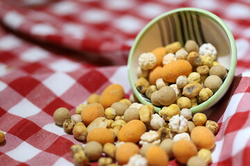 Various Nuts and dried fruits in wooden bowls