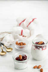 Danish Creamy Rice Pudding (Risalamande), Sweet Dessert Served with Warm Cherry Sauce for Christmas...