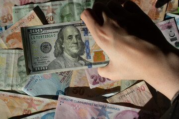 American US  currency and Turkish Lira business concept with dollars bill banknotes