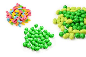 Juicy colorful jelly sweets isolated on white. Gummy candies. Snakes.