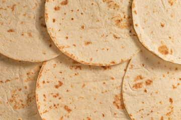 Grilled pitta bread isolated on white background.