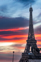 Fototapeta na wymiar Beautiful view of the famous Eiffel Tower in Paris, France during magical sunset. Best Destinations in Europe - Paris.
