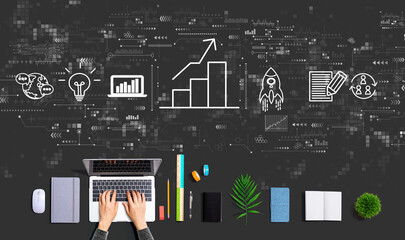 Business growth analysis with person using a laptop computer
