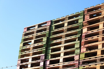 Piles of wooden cargo pallets