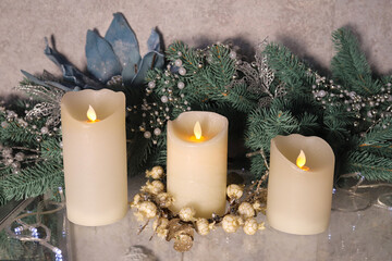 christmas decorative candles on the background of the Christmas tree