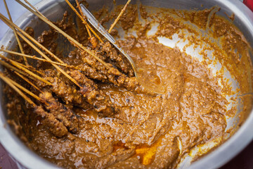 marinating chicken satay