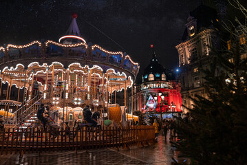Magical Christmas market spirit in Paris, France. Celebrating new years eve. Happy holidays.