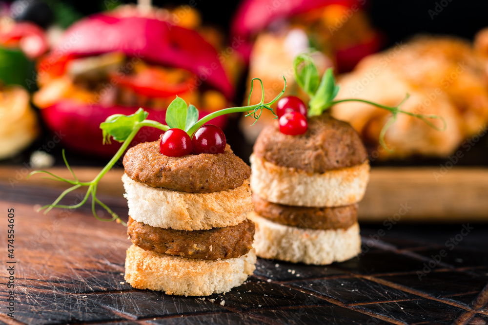 Sticker Toasted bread with liver pate. Gourmet appetizers Variety of mini sandwiches