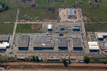 Dealerships of cars on the southern outskirts of the city of Samara. Aerial photo. Samara, Russia.