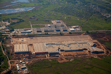 An unfinished large shopping center on the southern outskirts of the city of Samara. Aerial photo. Samara, Russia.