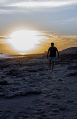 silhouette of a person on the beach