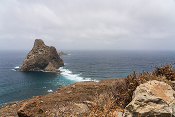 Natural landscape of the northern part of the island in Las Palmas De Anaga. In the background, the Atlantic Ocean and Roques de Anaga. Tenerife. Canary Islands. Spain.
