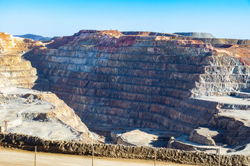 Corta Atalaya with mining levels at open mine pit. Deep excavation of pyrite and extraction of...