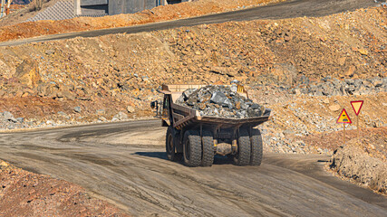 Ore extraction. The bulldozer car for transporting minerals, copper and iron ore in Spain