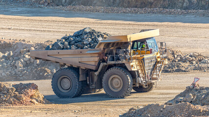 Ore extraction. The bulldozer car for transporting minerals, copper and iron ore in Spain