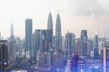 Naklejka na ściany i meble Forex and stock market chart hologram over panorama city view of Kuala Lumpur. KL is the financial center in Malaysia, Asia. The concept of international trading. Double exposure.