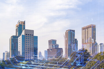 Technology hologram over panorama city view of Bangkok. The largest tech hub in Southeast Asia. The concept of developing coding and high-tech science. Double exposure.