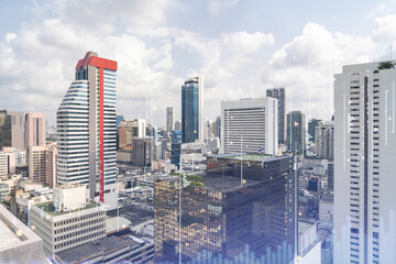 Fototapeta premium Forex and stock market chart hologram over panorama city view of Bangkok, the financial center in Southeast Asia. The concept of international trading. Double exposure.