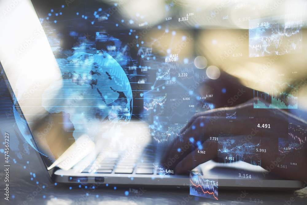 Poster close up of businessman hands using laptop with abstract glowing forex charts, graphs and globe on b