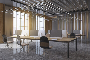 Luxury spacious concrete and wooden coworking office interior with window and daylight, table, computer monitors and other items. Law, legal and commercial concept. 3D Rendering.