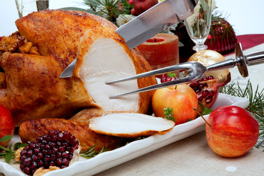 Carving Christmas Pomegranate Glazed Roasted Turkey