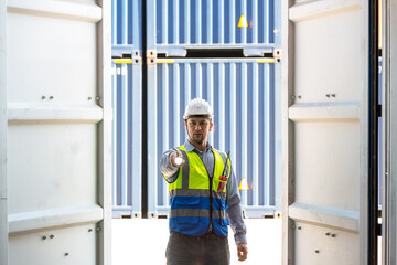 Professional foreman work at Container cargo site check up  goods in container. Workers are opening containers for inspection and check.