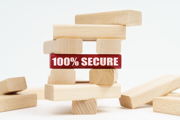 On the white surface there is a ruined tower made of planks, on a red plaque there is an inscription - 100 Secure