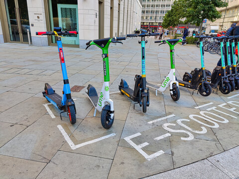 Electronic scooters parked up in the city of London ready for hire