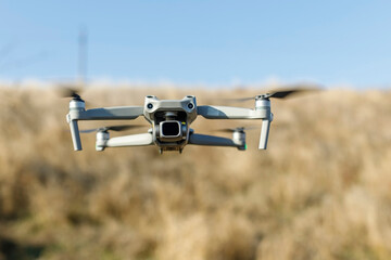 close up photo of flying drone with digital camera