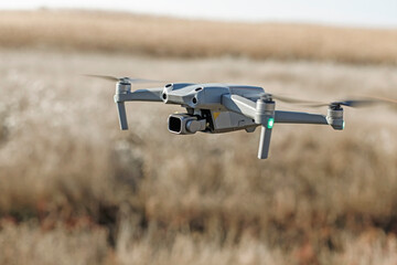 close up photo of flying drone with digital camera