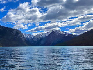 Lake Minnewanka Rocky Mountains and blue sky