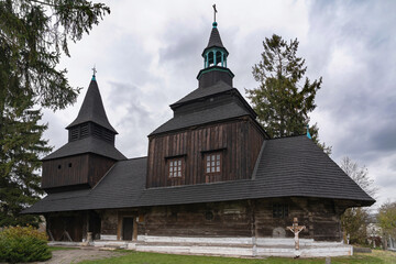 Fototapeta na wymiar Old wooden church of the 16-17th century in a in Rohatyn city, of Ukraine