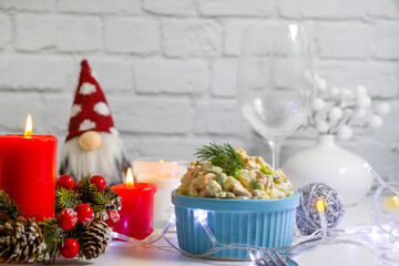 olivier salad in a plate christmas background
