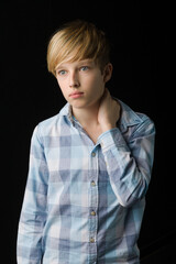 Portrait of attractive blond teenage boy