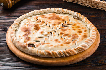 homemade dietary ossetian pie with cabbage and brisket