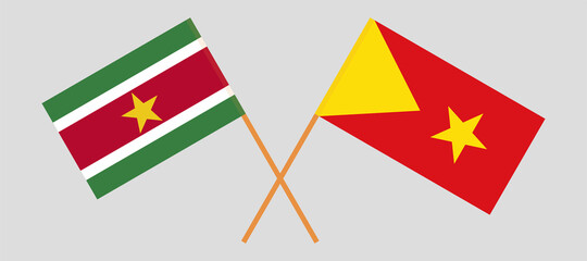 Crossed flags of Suriname and Tigray. Official colors. Correct proportion