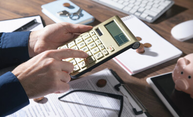Fototapeta premium Businessman using calculator. Business. Accounting