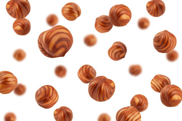 Falling Hazelnut peeled, isolated on white background, selective focus