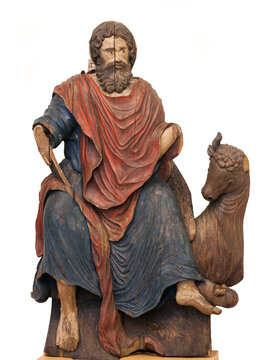 Ancient wooden bas-relief of Luke the Evangelist and winged ox from Russian Orthodox Church in Veliky Ustug, Vologda Province, Russia