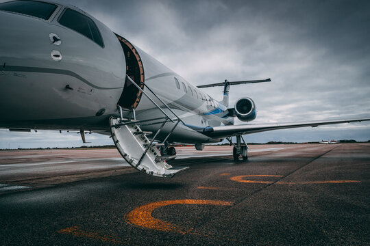 Private Jet at airport - Powered by Adobe