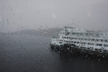rain drops on ferry window © Erika