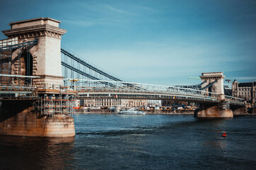 Chain Bridge of Budapest under renovation. Reconstruction works. Famous tourist place closed. Sunny day