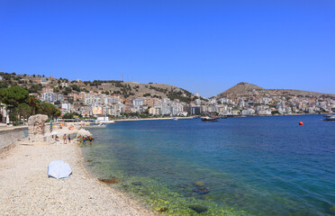 Beach with azure water of the Ionian Sea in Saranda, Albania