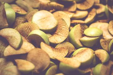 The process of home cooking dried fruits in an electric dryer.