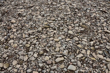 Round rocks stacked outside