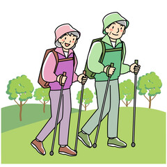 ポールを持ってウォーキングをするシニア夫婦